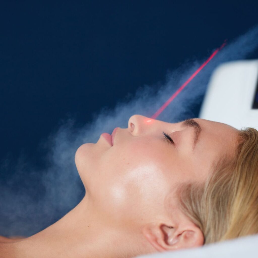 woman getting cryo therapy on face