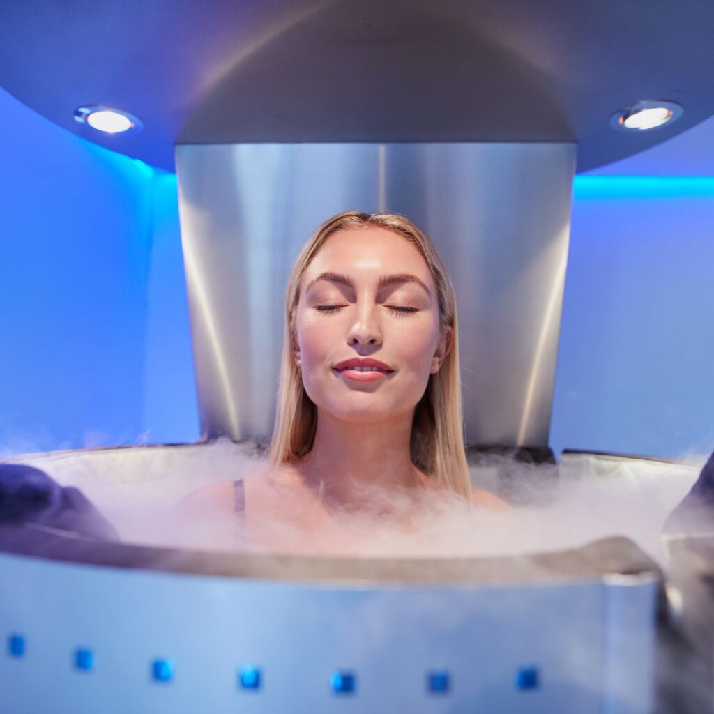 Woman in a  cryotherapy machine. 