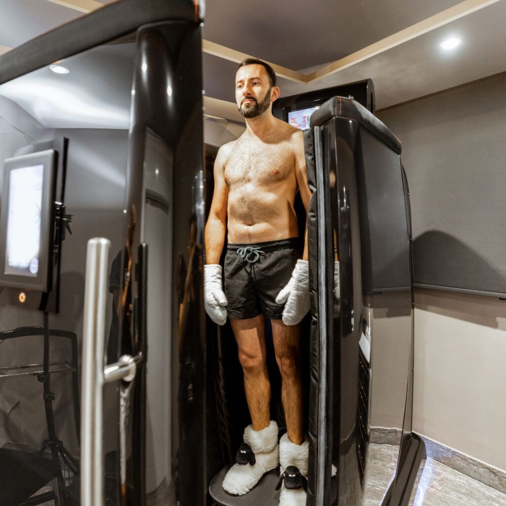 man in a cryotherapy chamber 
