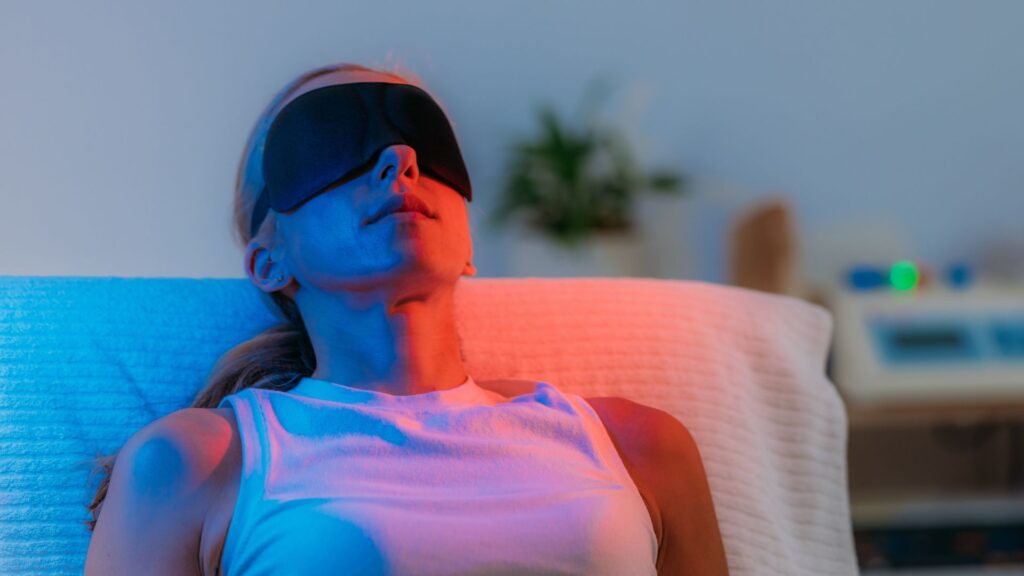 woman experiencing red light therapy