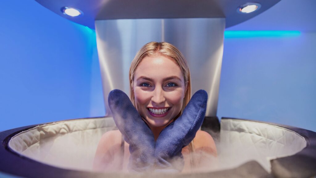 woman smiling in cryochamber