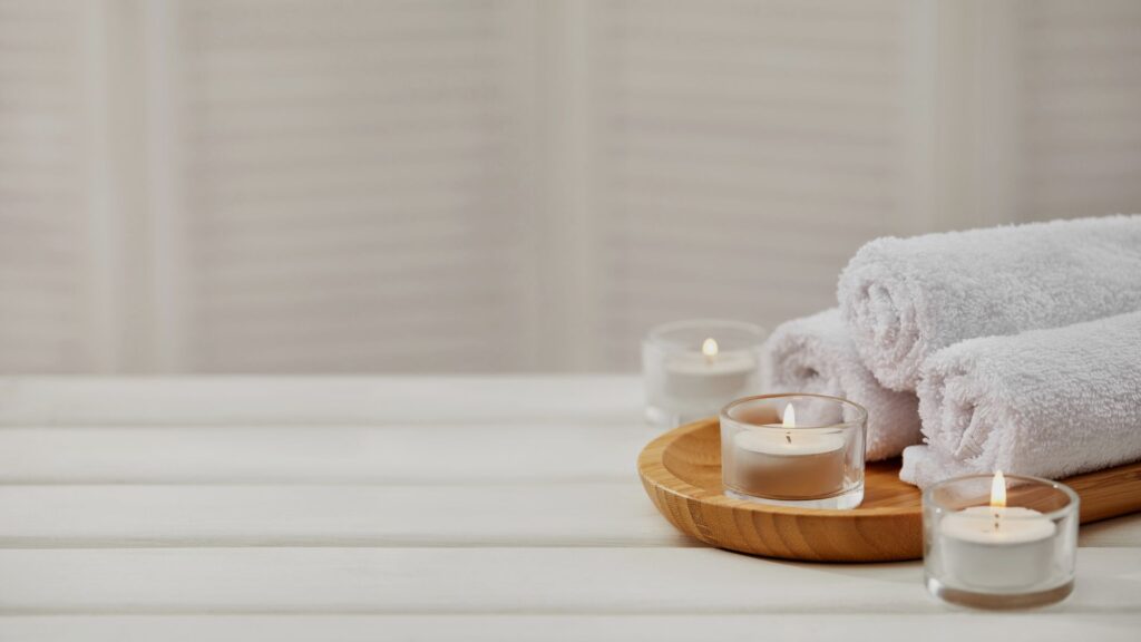 spa towels and candles