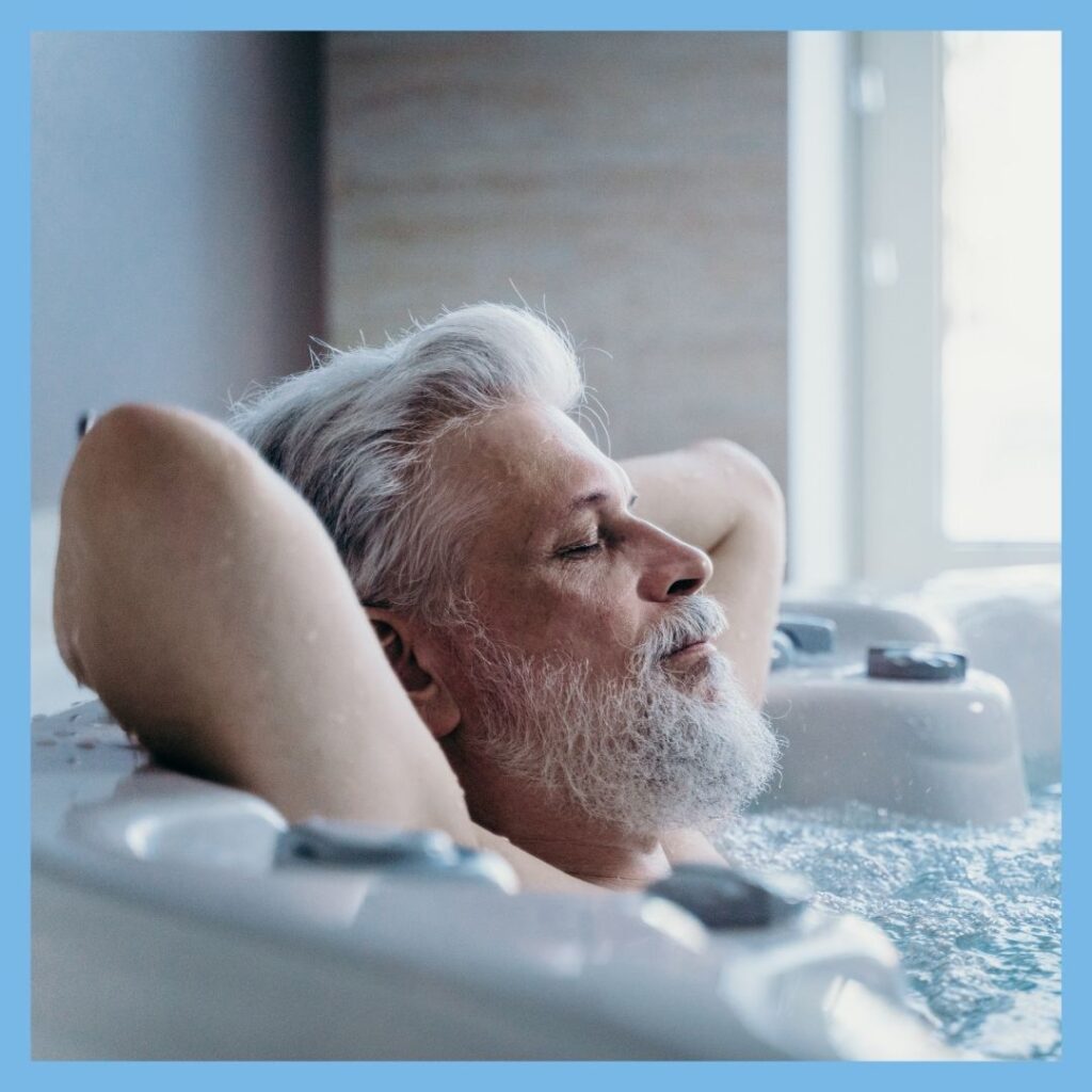 man relaxing in ice water